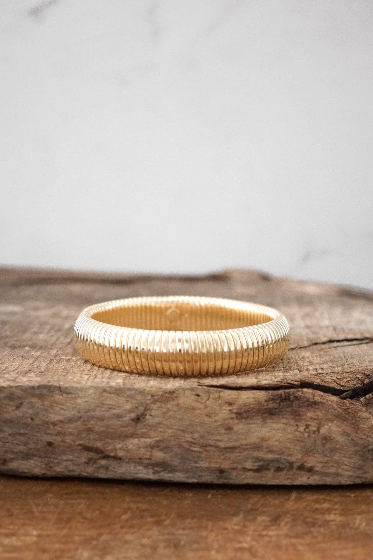 Gold tone flexy stretchy bracelet bangle