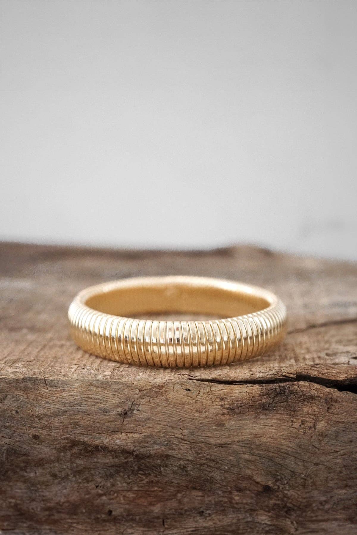 Gold tone flexy stretchy bracelet bangle
